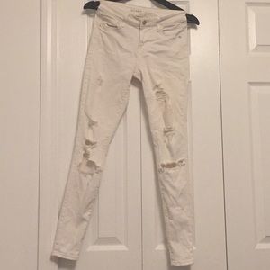 Ripped skinny jeans, mid-rise